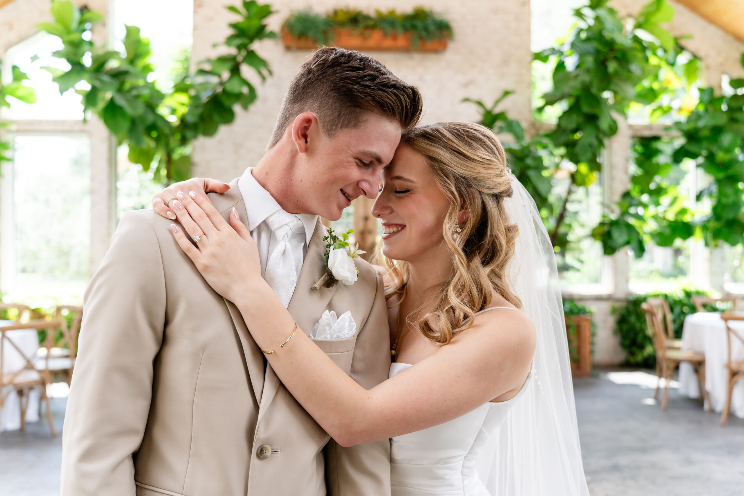 High-end wedding photography of a bride and groom at The Greenery venue in Amite City Louisiana captured by Edward Miller Films.